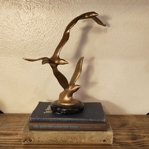 Elegant Gold Bird Sculpture